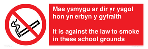 Mae ysmygu ar dir yr ysgol hon yn erbyn y gyfraith It is against the law to smoke in these school grounds - Bilingual Welsh / English
